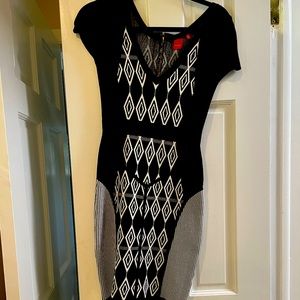 Black and white stretchy dress. Very flattering.